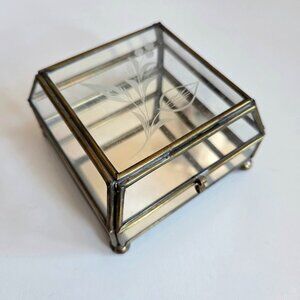 Vintage glass and brass footed jewelry or trinket box with floral design on lid